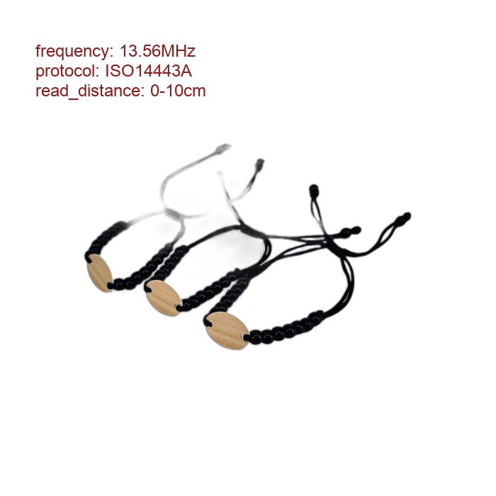 Three black bead bracelets with light wooden round charms and adjustable cords arranged on a white background.