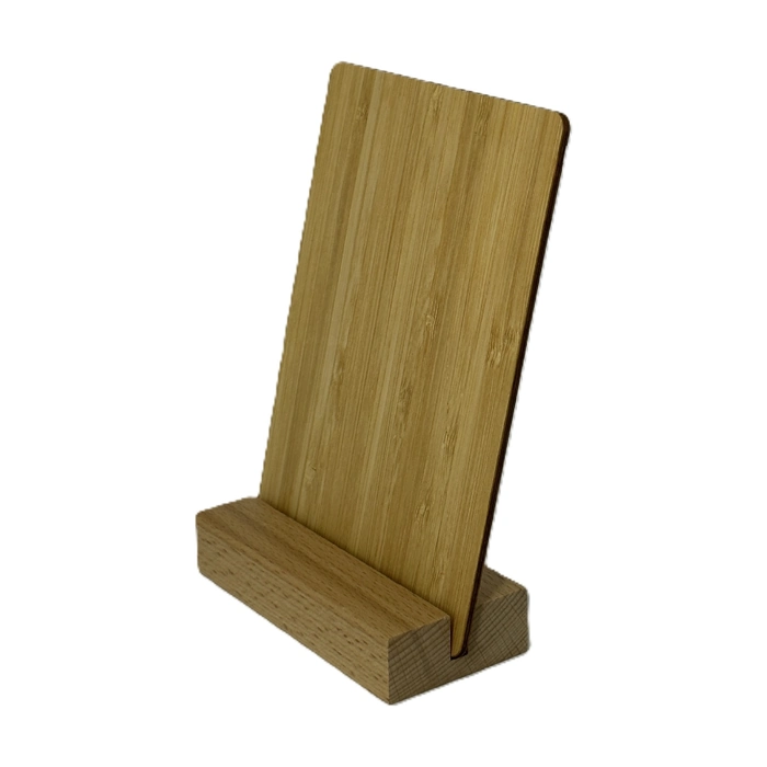 Plain bamboo display plaque standing in a grooved block base.