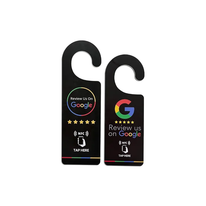 Two black hotel door hangers with different review artwork and NFC tap prompts.
